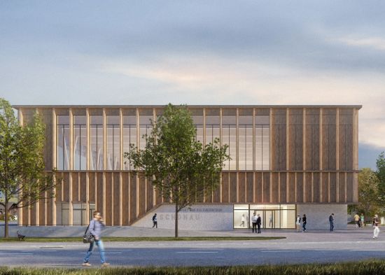 Die Fassade ist durch eine vertikale Holzteilung strukturiert und spiegelt den Bestand wieder.